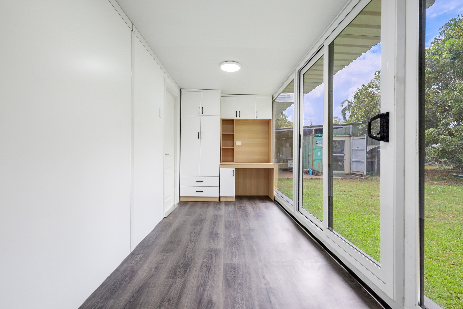 40ft Containerised Slide Out Home - With Infinity Glass Frontage