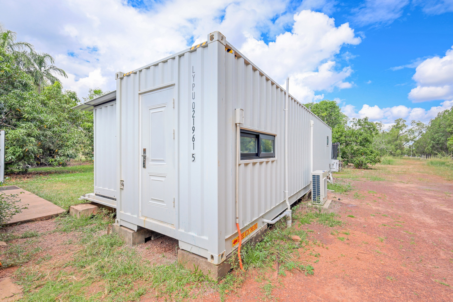 40ft Containerised Slide Out Home - With Infinity Glass Frontage